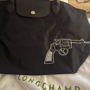 Limited Edition Longchamp Le Pliage with embroidered gun/bang